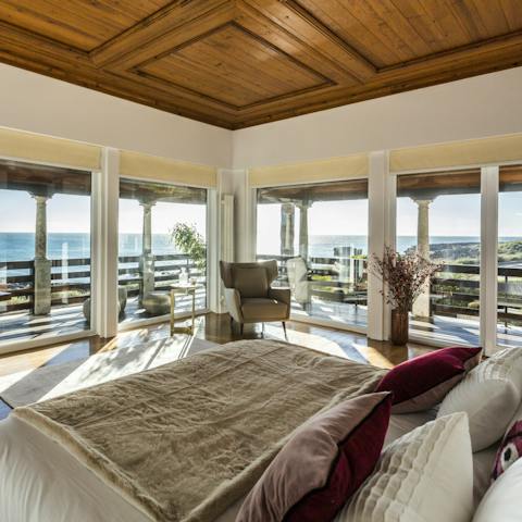 Wake up to panoramic views of the ocean from the main bedroom