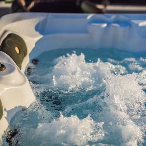 Unwind in the hot tub jacuzzi after an active day on the slopes