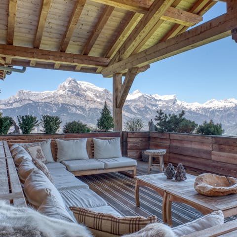 Admire panoramic views of Mont Blanc from the covered terrace
