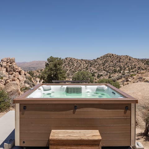Soak up desert views of the Yucca Valley from the hot tub