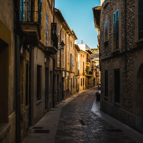 Explore the old town of Pollença, a short drive away