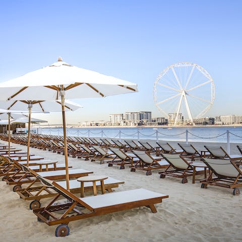 Bag a lounger on JBR beach, right outside your front door