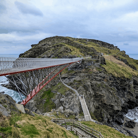 Head to Tintagel Castle over the bridge and explore the home that legend says King Arthur stayed in