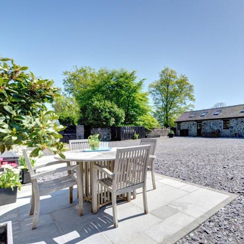 Sit out in the sunshine of your private walled courtyard after a morning hike