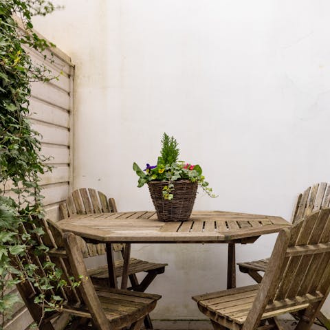 Head to your private garden courtyard for pre-dinner drinks