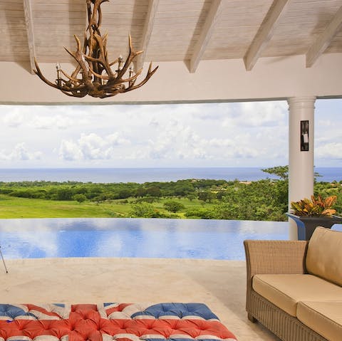 Relax on the terrace and admire the sweeping view out to sea