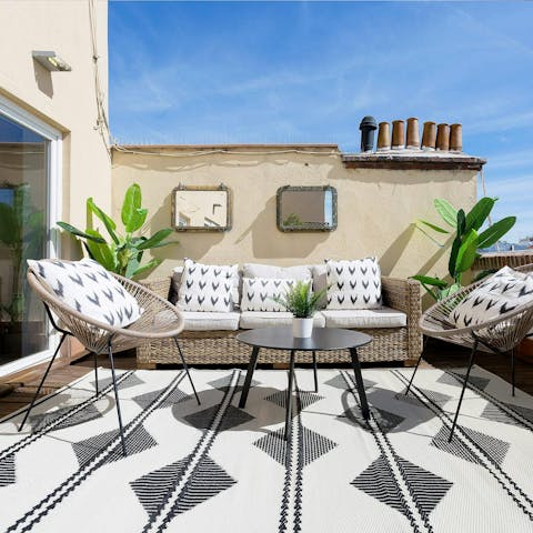 Relax with your holiday read on the sun-soaked private terrace