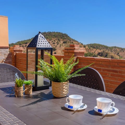 Enjoy a refreshing cup of tea and admire the scenery on the balcony 