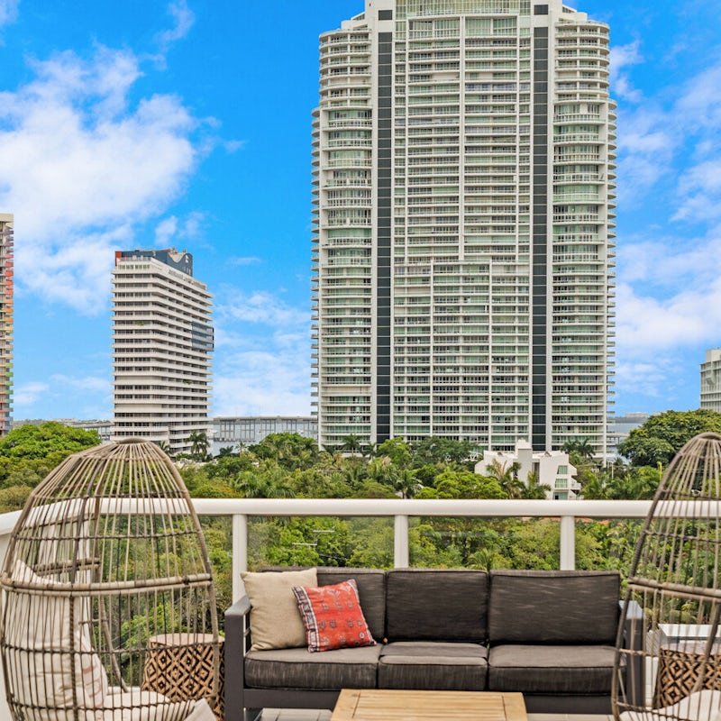 Head up to the roof terrace and watch the city life below