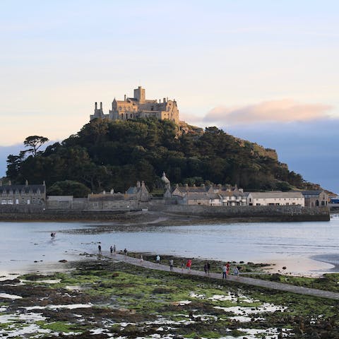 Catch a glimpse of St Michael's Mount from Marazion Beach, just a five-minute drive away