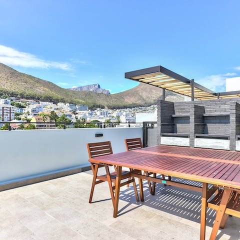 Take in picturesque views from the communal barbecue terrace