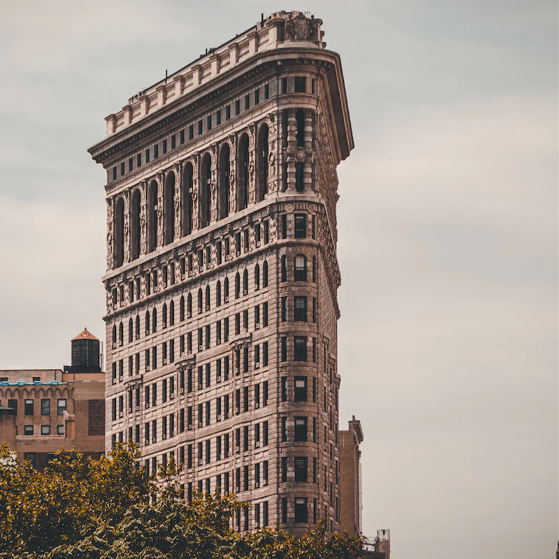 Take some pictures of the Flatiron Building, a ten-minute stroll from this home
