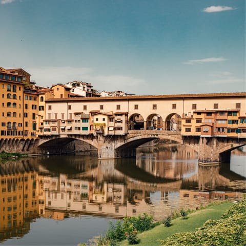 Visit the medieval Ponte Vecchio, a ten-minute walk away