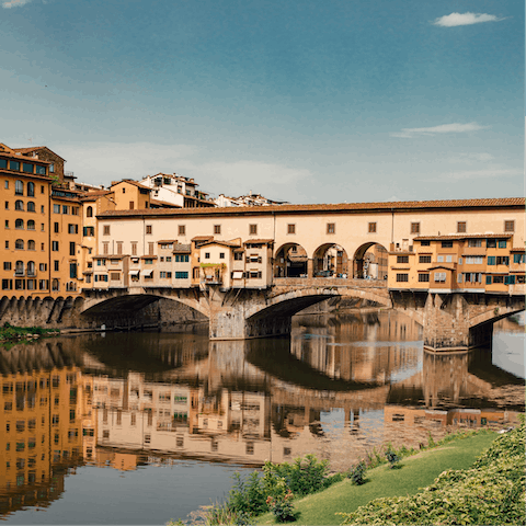 Visit the medieval Ponte Vecchio, a ten-minute walk away