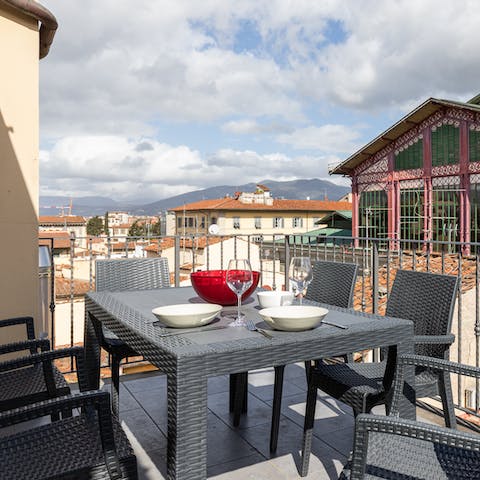 Dig into a spread of Tuscan delights on your private terrace