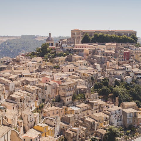 Explore the hilltop city of Ragusa, a sixteen-minute drive away