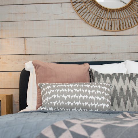 Sleep well in the sumptuous bedroom, underneath exposed wooden beams