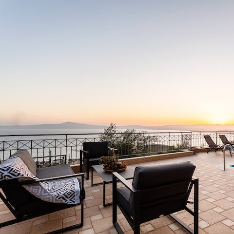 Watch the sun set over the Messenian Gulf on the terrace
