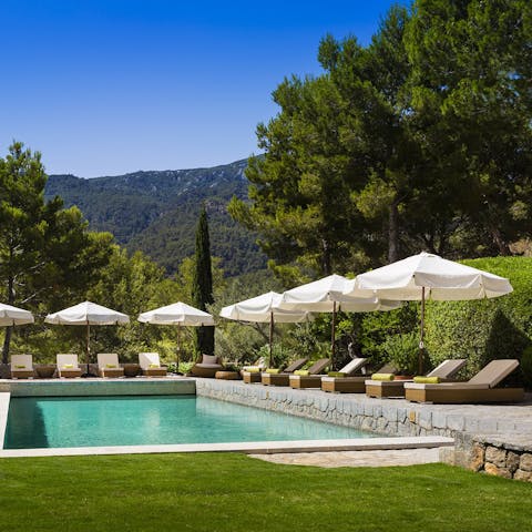 Lounge by the pool under the hot Mallorcan sun 