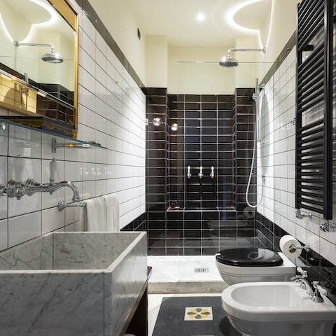Wash off the day's exploring under the luxurious bathroom's rainfall shower