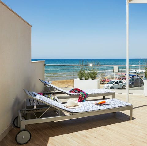 Soak up the Sicilian sunshine from the terrace loungers