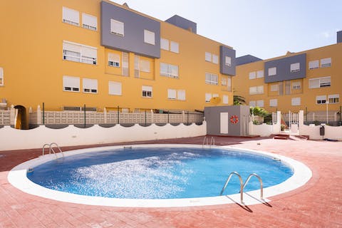 Cool off from Tenerife's sunshine with a swim in the shared pool