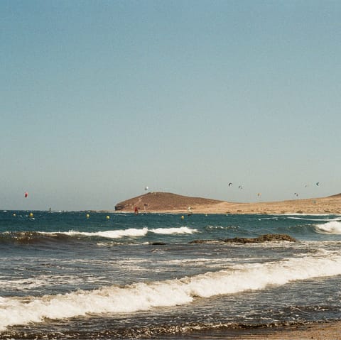 Stroll down to El Médano beach and dip your toes in the Atlantic Ocean