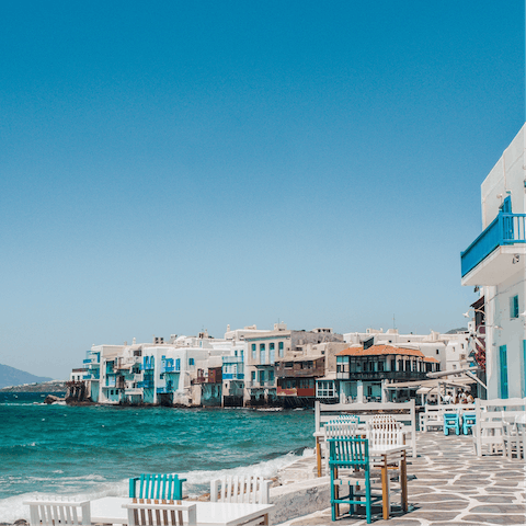 Take a walk through the gorgeous town of Mykonos, just a ten-minute drive from your villa