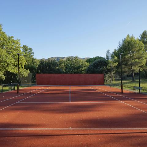 Serve up an ace on the outdoor tennis court before lunch