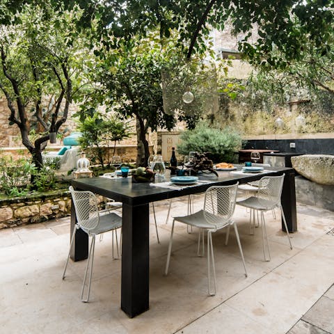 Enjoy a long, lazy lunch surrounded by greenery on the patio