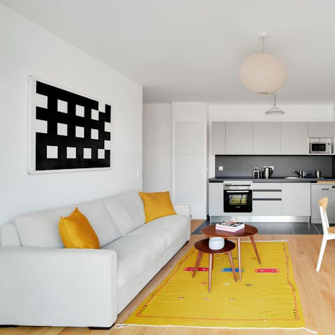 Unwind after sightseeing in the bright living area