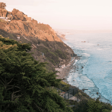 Join the famous Route One highway to view the rugged coast of Malibu, eleven minutes from home
