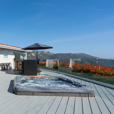 Soak in the rooftop hot tub all night long under the stars