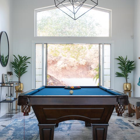 Challenge your friends to a game of pool before dinner