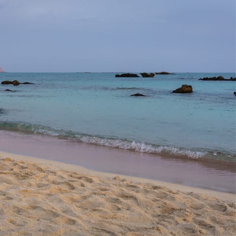 Drive to the golden sands of Anissaras beach