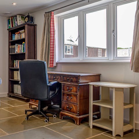 Work from home at the antique desk in the private study