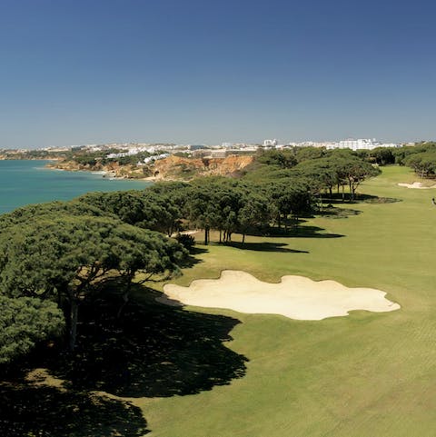 Tee off under the sun and go for a hole-in-one on the resort's luxurious golf course