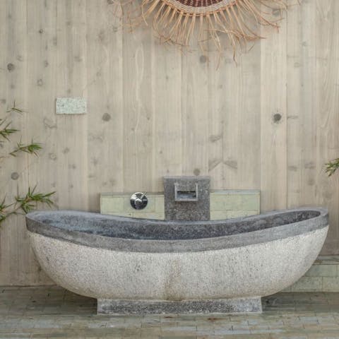 Revitalise in the outdoor stone bath