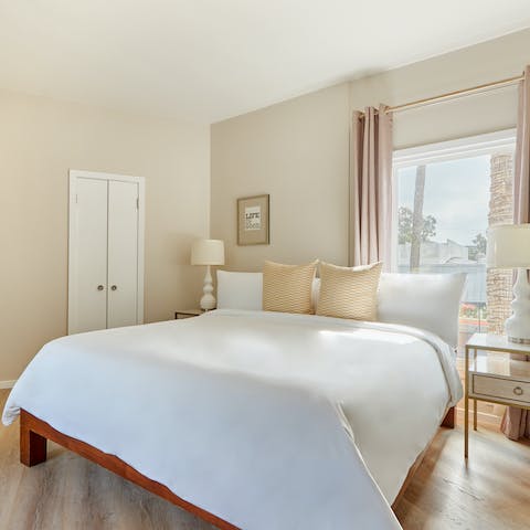 Wake up to palm trees swaying right outside your window