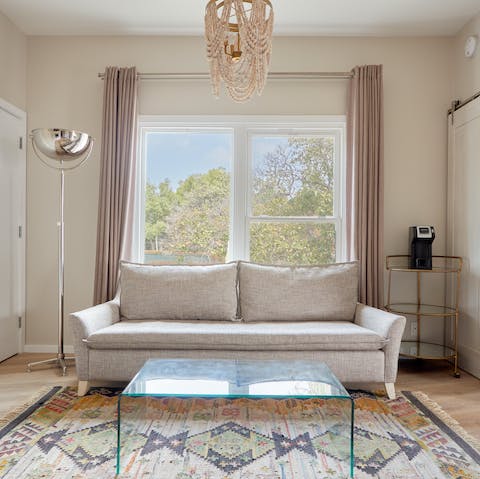 Kick back in the bright living area with your morning coffee while catching up on the news