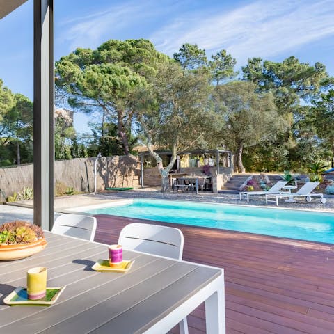 Dine alfresco after splashing around in the private pool with your family