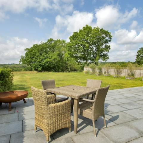 Enjoy an afternoon tea on the terrace with lovely garden views