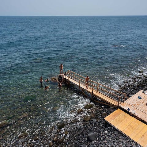 Go for a dip on the lava-black beach via direct access from the garden