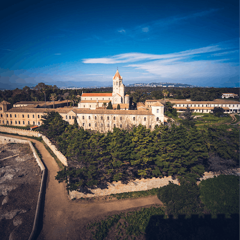 Explore Lérins Abbey on the island of Saint-Honorat, a fifteen-minute ferry trip away
