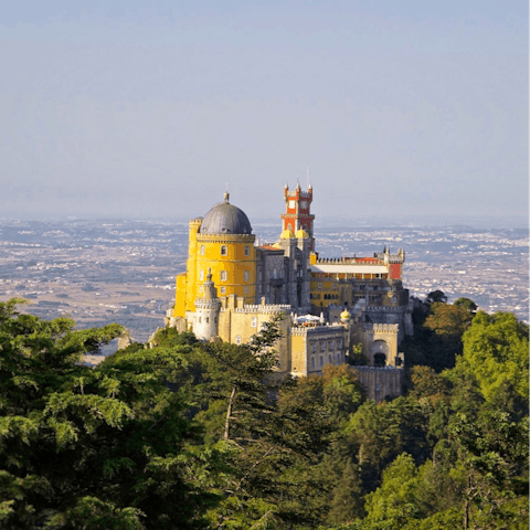 Head into charming Sintra, a fifteen-minute drive away