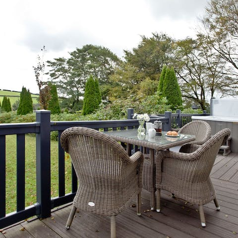 Sit out on the deck and enjoy some drinks or an alfresco lunch with beautiful views
