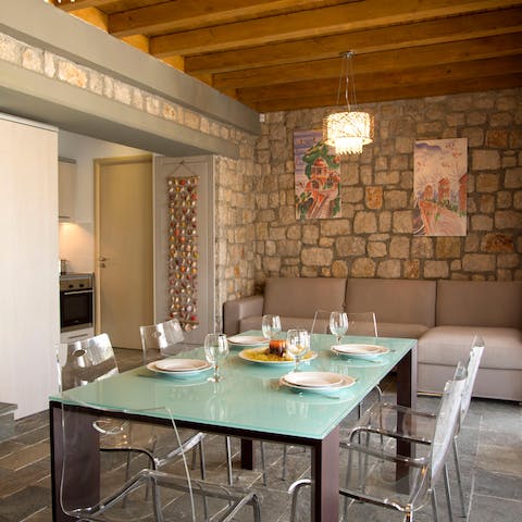 Sit down to a celebratory feast in the stone-walled living area