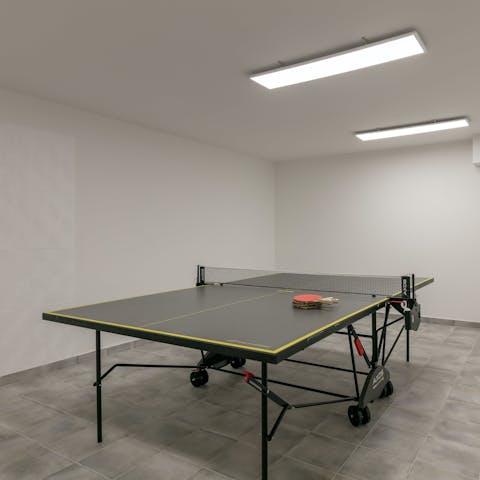 Play a few games of ping pong in the games room