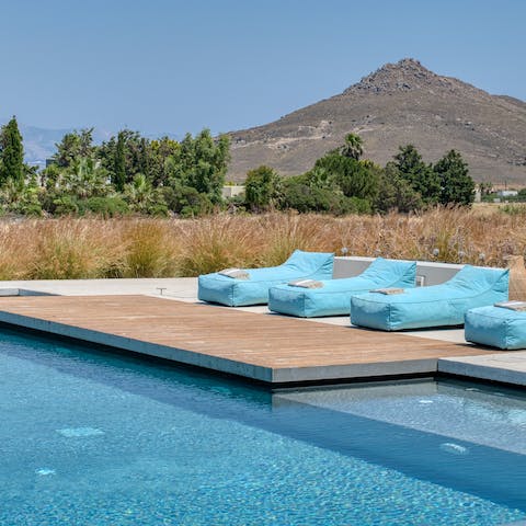 Take in the mountain views from the private pool
