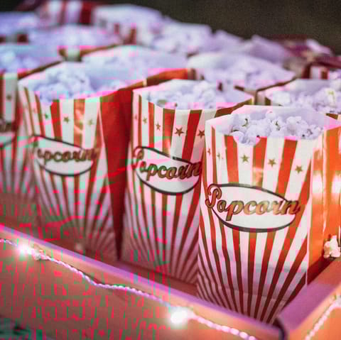 Watch your favourite film on the projector screen in the media room